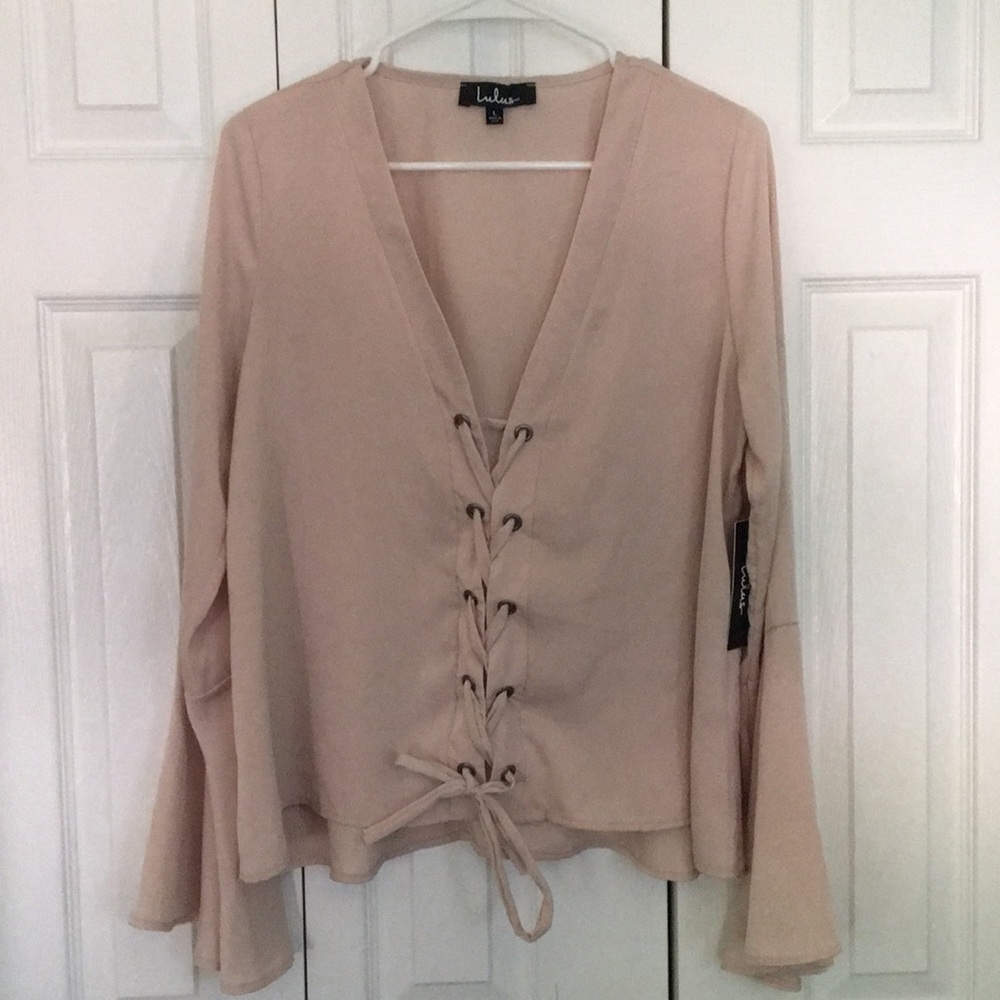 Lace-up beige bell-sleeve top
